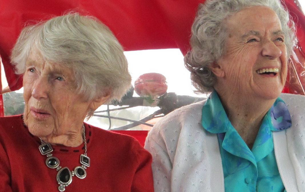 2 ladies feeling wind in their hair